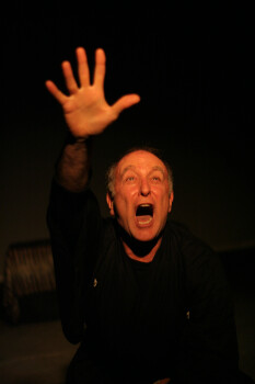 Fred Curchack performs the Noh play Shunkan. Man crying out for deliverance.